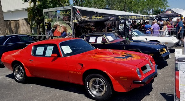 The Bandit Movie Cars of Florida booth at Barrett-Jackson Palm Beach