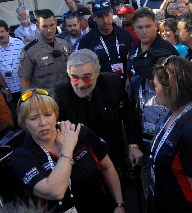 Burt Reynolds leaves the Barrett-Jackson Palm Beach Auction on April 7, 2017