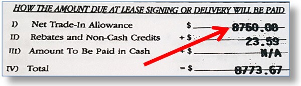 Example sales contract shows dealer is paying $8670 for the buyer's trade-in vehicle