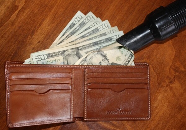 money vacuumed out of wallet